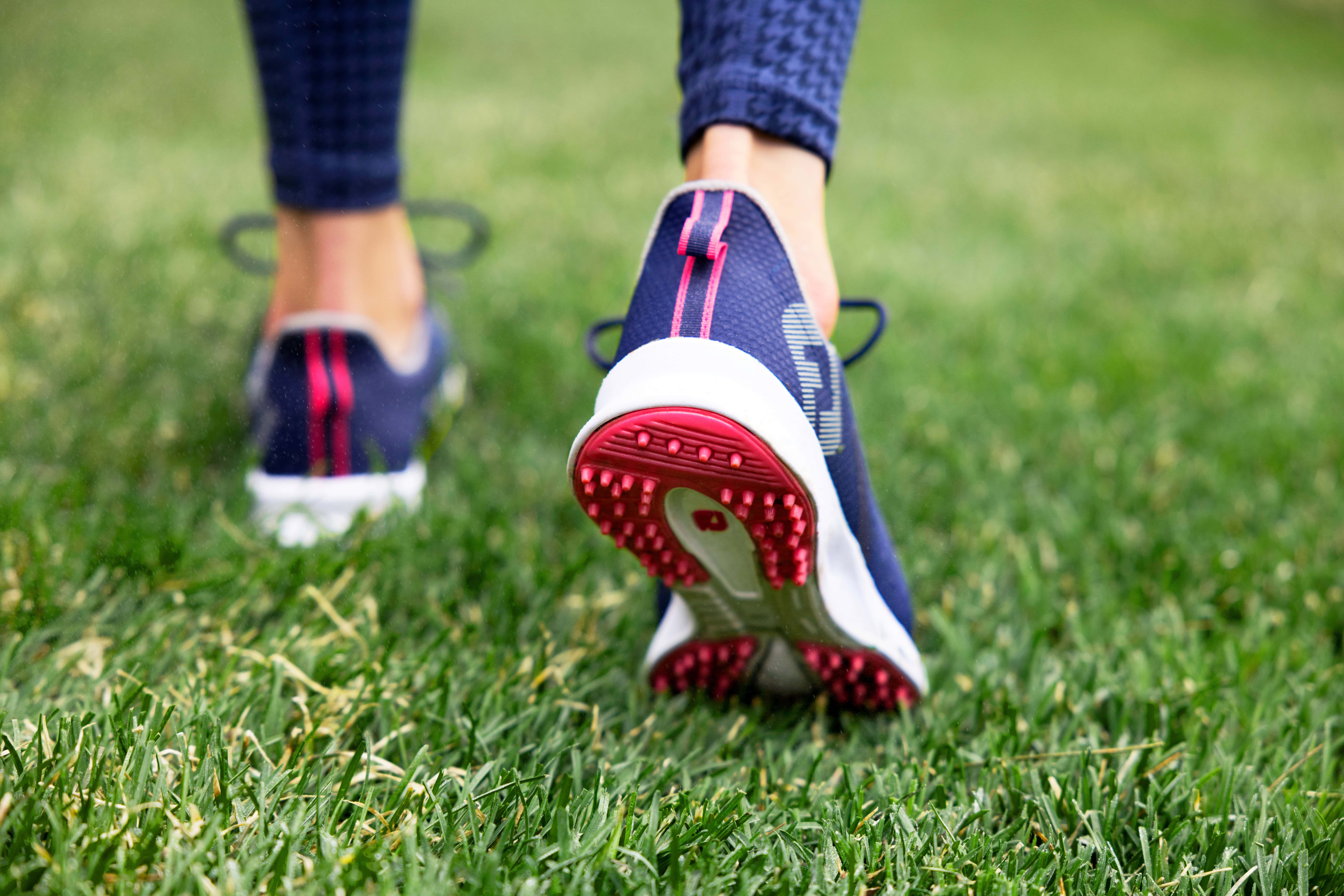 Close up of a woman's shoes walking on a golf course. Image taken by lifestyle product photographer Hannah Dunsirn, based in LA CA.