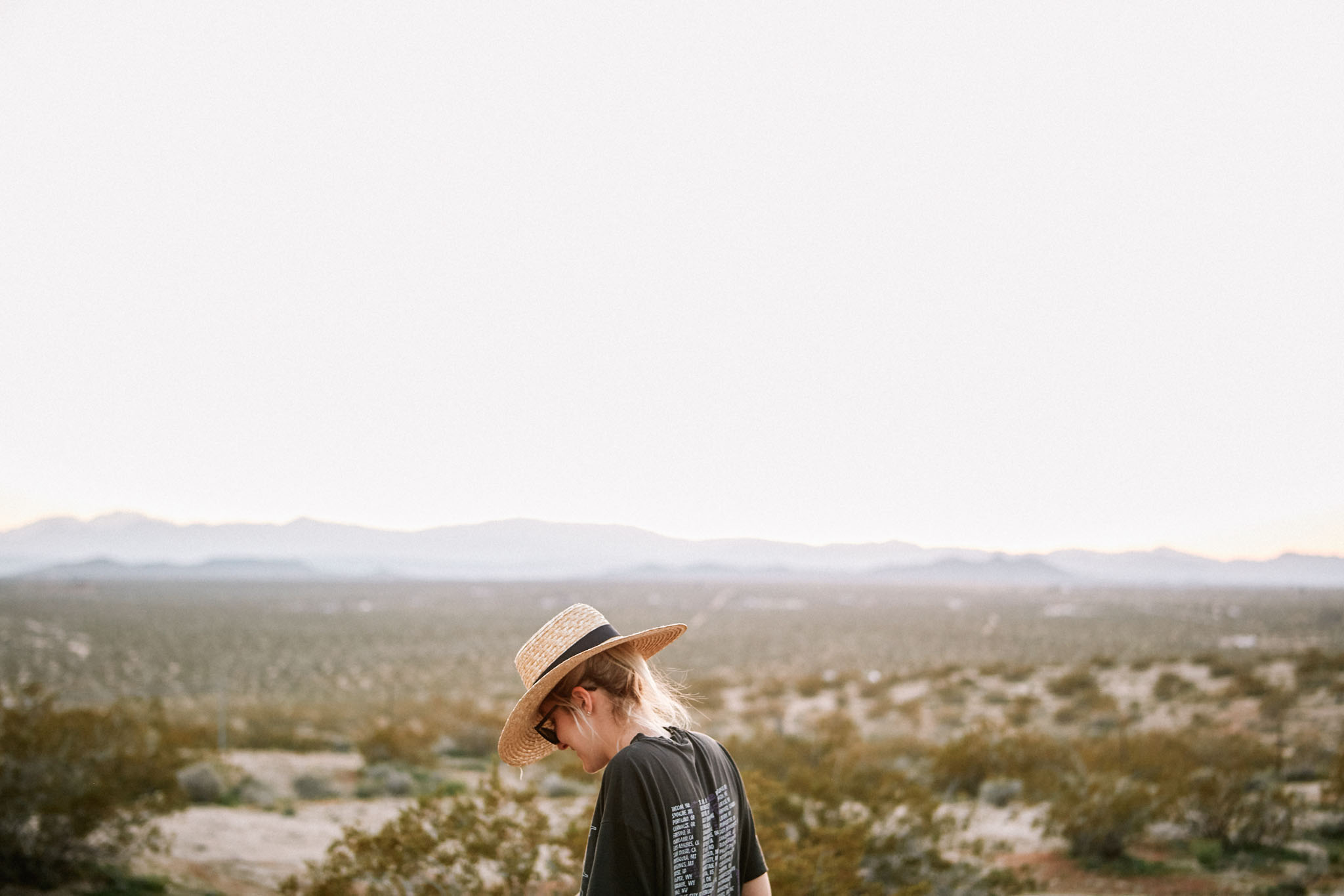 Woman looking out over a view taken by a commercial lifestyle photographer